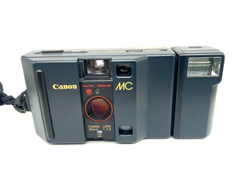 Canon point shoot - con, 35