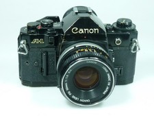 Canon A-1 con obiettivo Canon